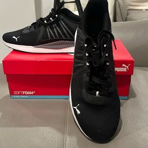 Lightly worn Puma shoes.Size 12.SoftFoam+. Black with a white sole. Very clean.